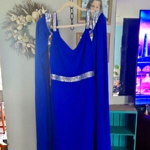 p 44  ptp 21.25 Blue Sleeveless Prom Gown with Silver Embellishments